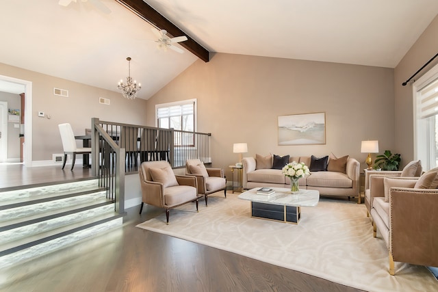 living room with wood finished floors, visible vents, baseboards, beam ceiling, and ceiling fan with notable chandelier