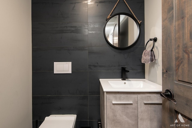 bathroom with vanity and toilet