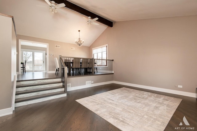 unfurnished dining area featuring beamed ceiling, a healthy amount of sunlight, dark wood-style flooring, and baseboards