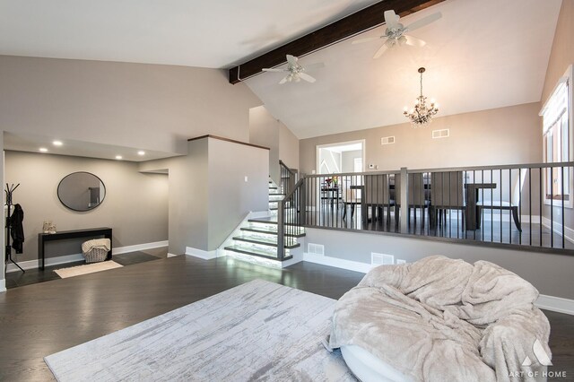 living area featuring visible vents, baseboards, stairs, beam ceiling, and wood finished floors