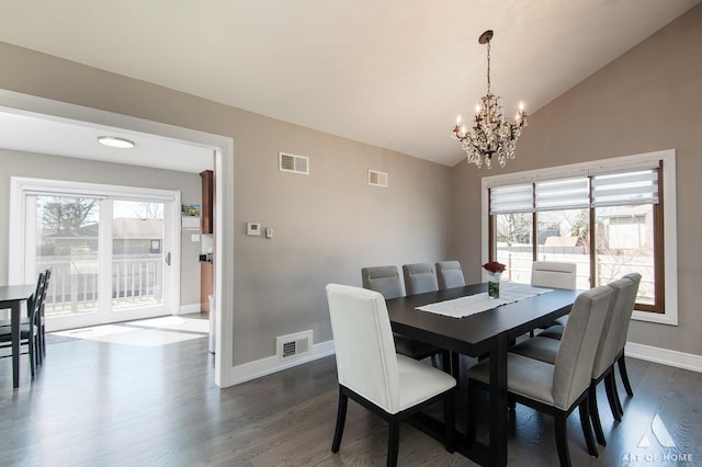 dining room featuring lofted ceiling, baseboards, visible vents, and dark wood-type flooring