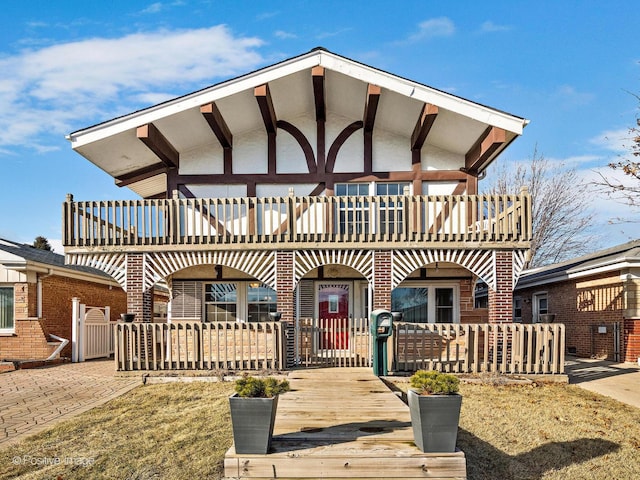 view of front of property featuring brick siding