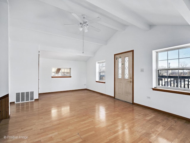 foyer featuring visible vents, light wood-style flooring, lofted ceiling with beams, ceiling fan, and baseboards