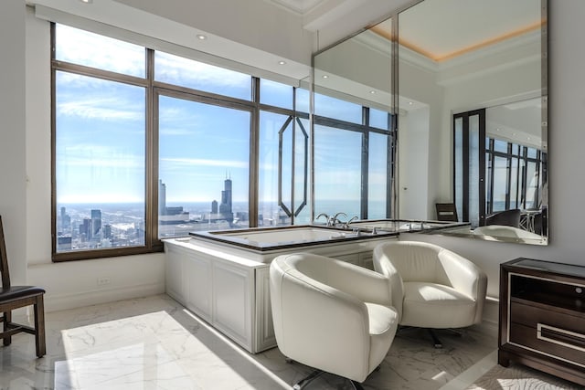 interior space with marble finish floor, a view of city, and baseboards