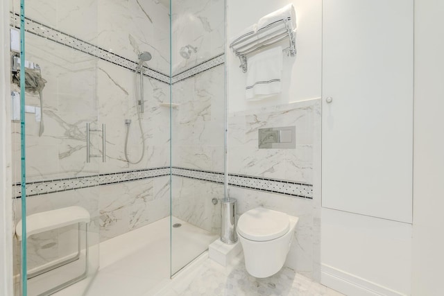 full bathroom featuring toilet, marble finish floor, and a marble finish shower