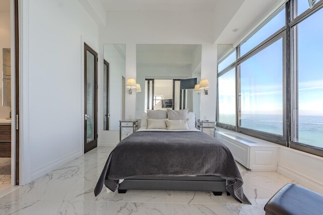 175 E Delaware Pl Unit 9106-07Ph, Chicago, IL 60611 - bedroom featuring baseboards, marble finish floor, and a water view