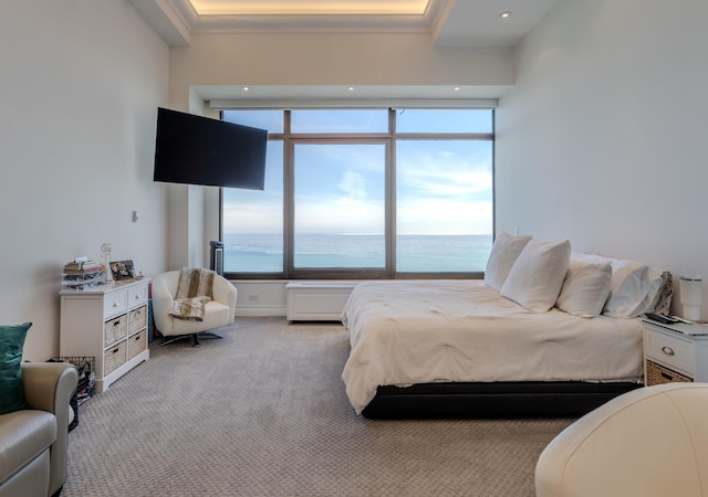 bedroom with recessed lighting, multiple windows, light carpet, and ornamental molding