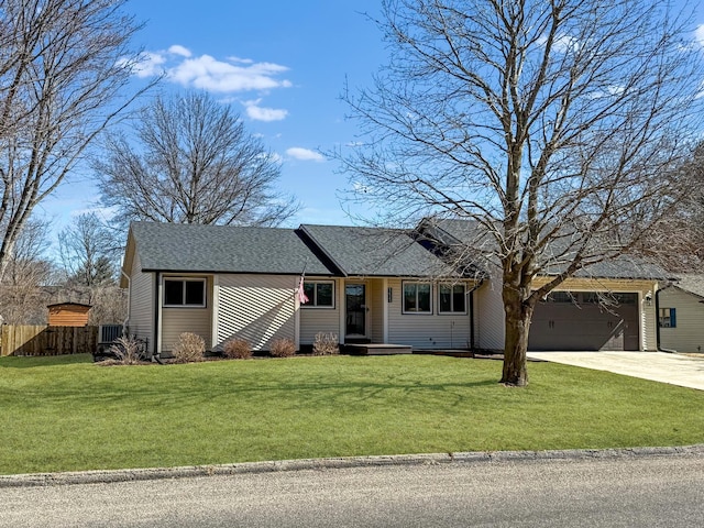 ranch-style house featuring an attached garage, driveway, fence, and a front lawn