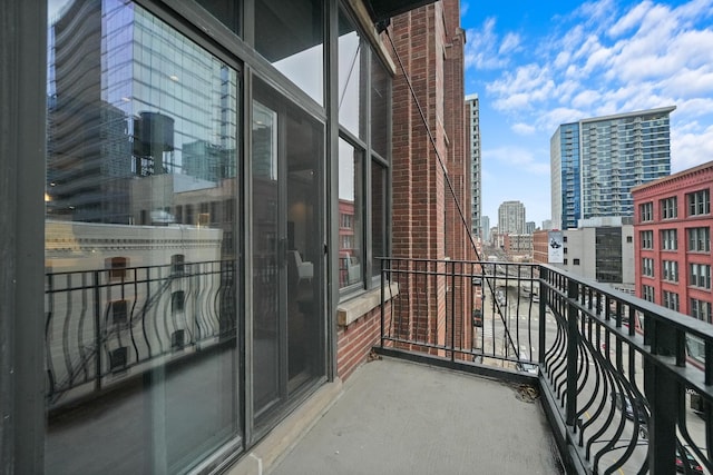 balcony featuring a city view