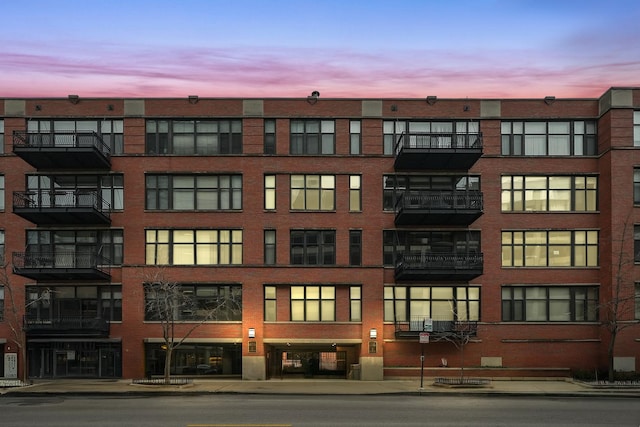 view of property at dusk