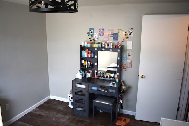 office with baseboards and dark wood-type flooring