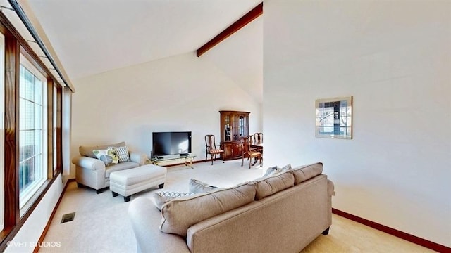 living room featuring baseboards, visible vents, high vaulted ceiling, beam ceiling, and light carpet