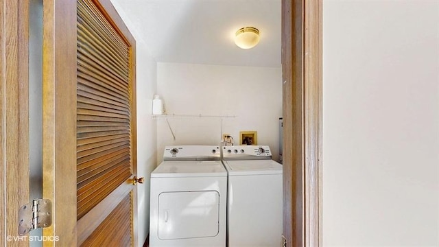 clothes washing area featuring laundry area and independent washer and dryer