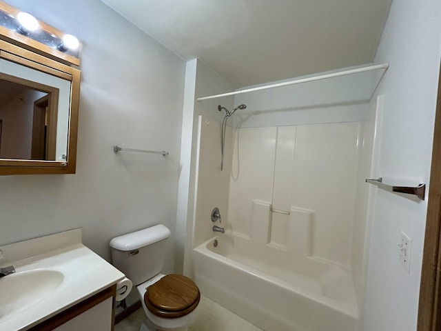 bathroom featuring toilet, bathing tub / shower combination, and vanity