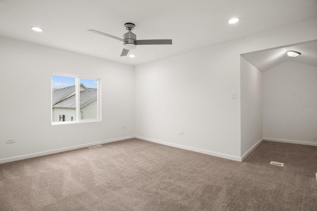 carpeted empty room with visible vents, recessed lighting, baseboards, and a ceiling fan