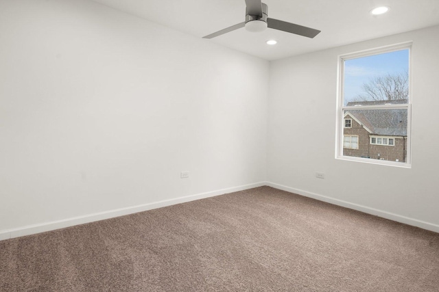 carpeted empty room featuring recessed lighting, a ceiling fan, and baseboards