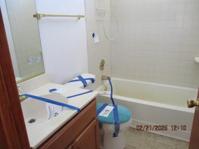 full bathroom with tile patterned flooring, vanity, and bathing tub / shower combination