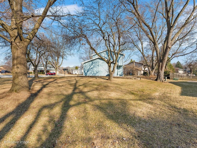 view of yard featuring fence