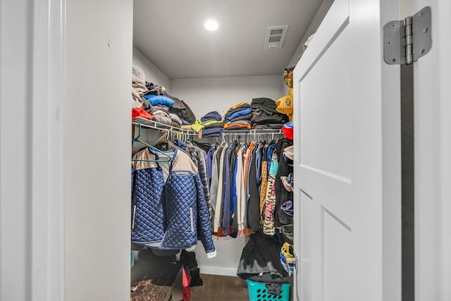 walk in closet featuring visible vents