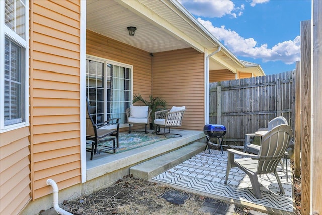 view of patio / terrace with fence