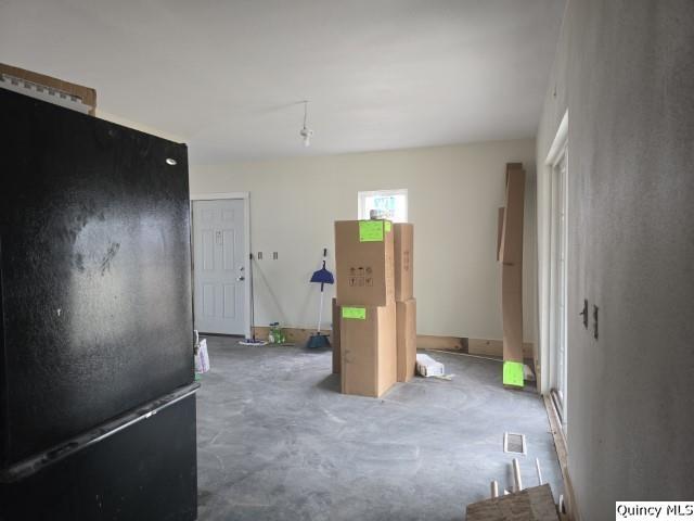 interior space with concrete flooring