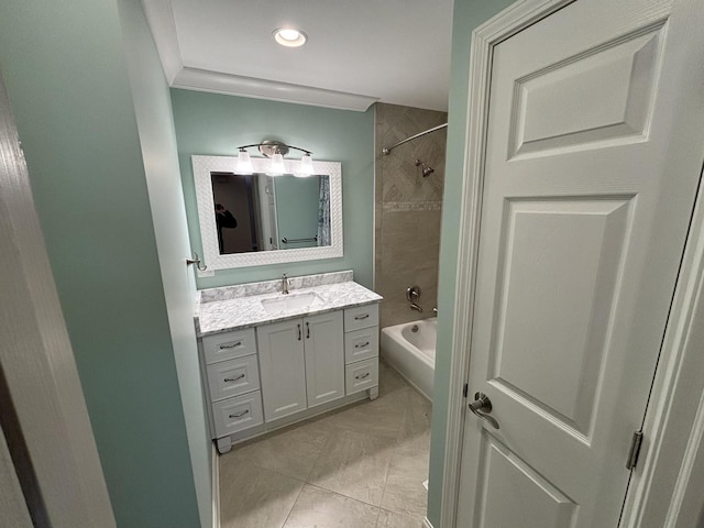 bathroom with  shower combination, crown molding, and vanity