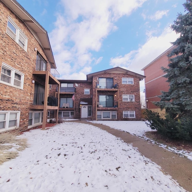 view of snow covered property