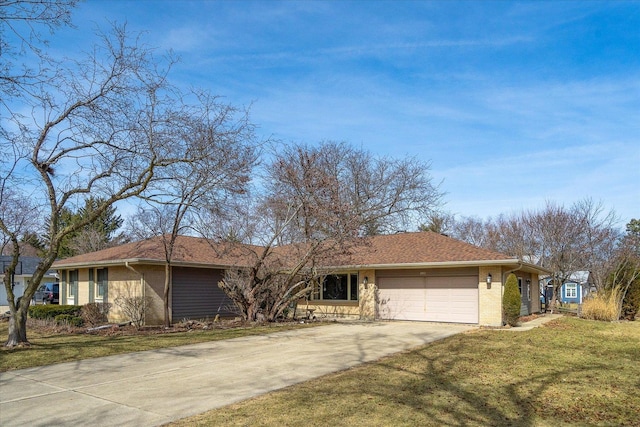 ranch-style house with concrete driveway, an attached garage, brick siding, and a front lawn