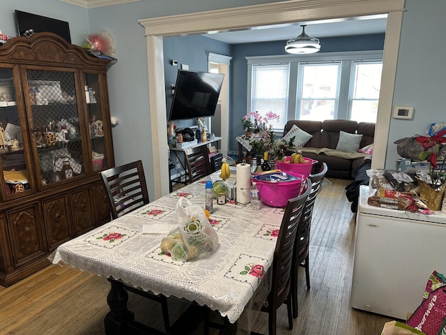 dining room with wood finished floors