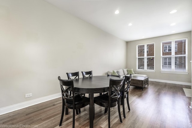 dining area featuring baseboards, dark wood-style flooring, and recessed lighting