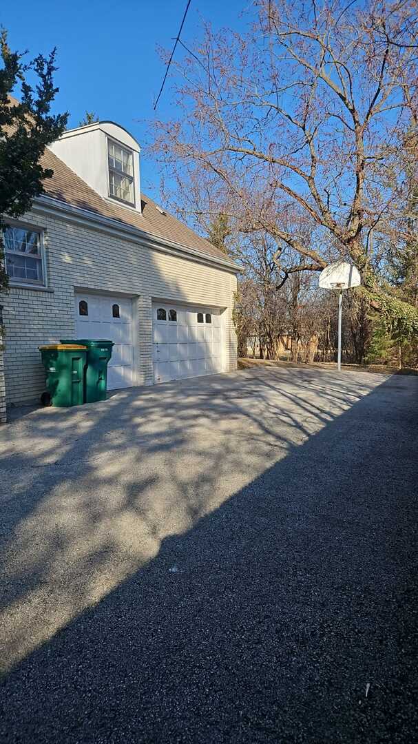 garage with driveway