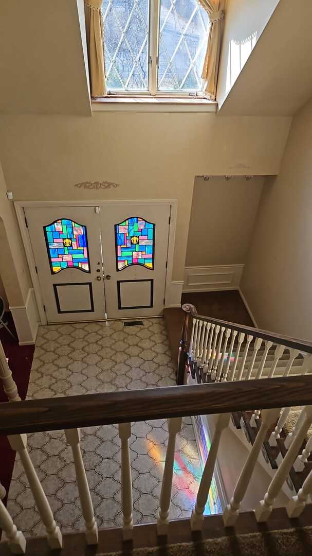 foyer featuring stairway