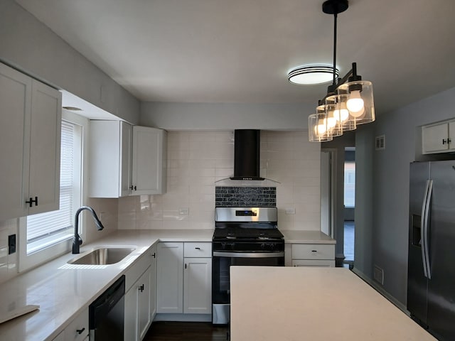 kitchen featuring a sink, light countertops, wall chimney range hood, appliances with stainless steel finishes, and tasteful backsplash