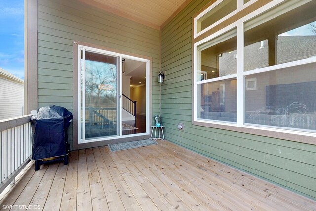 wooden terrace with grilling area