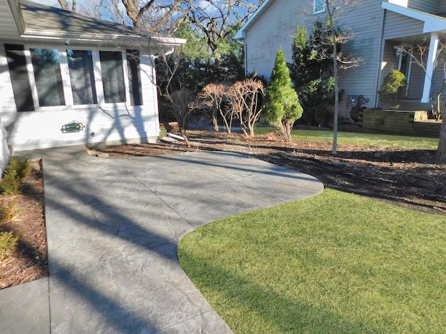 view of property exterior featuring a yard