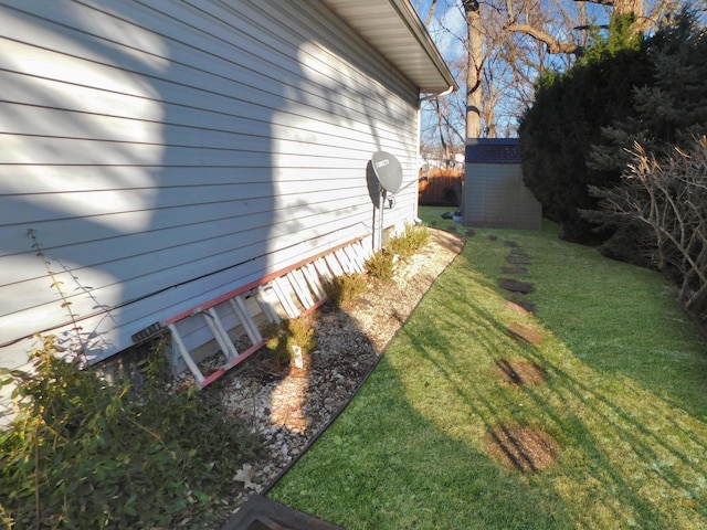 view of yard with an outbuilding and a storage shed