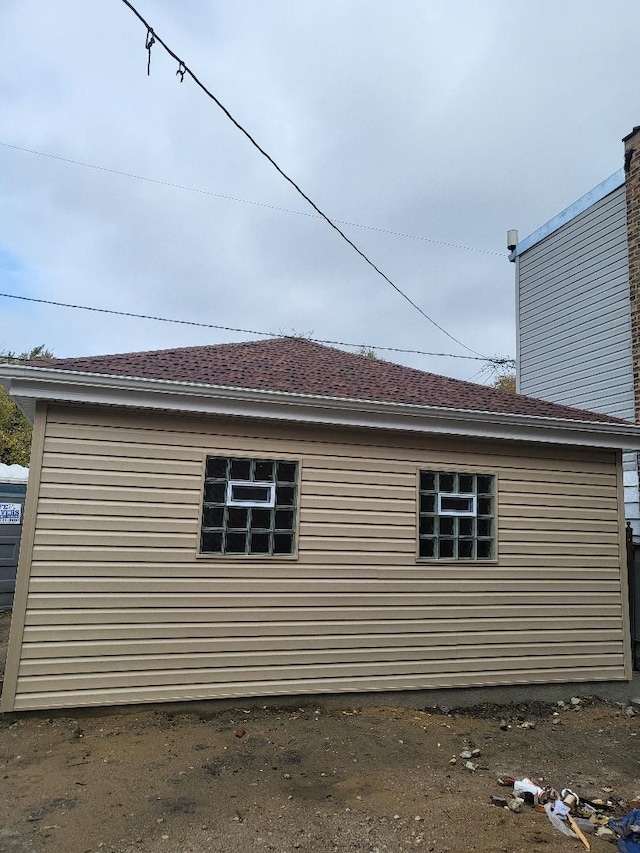 view of property exterior with a chimney