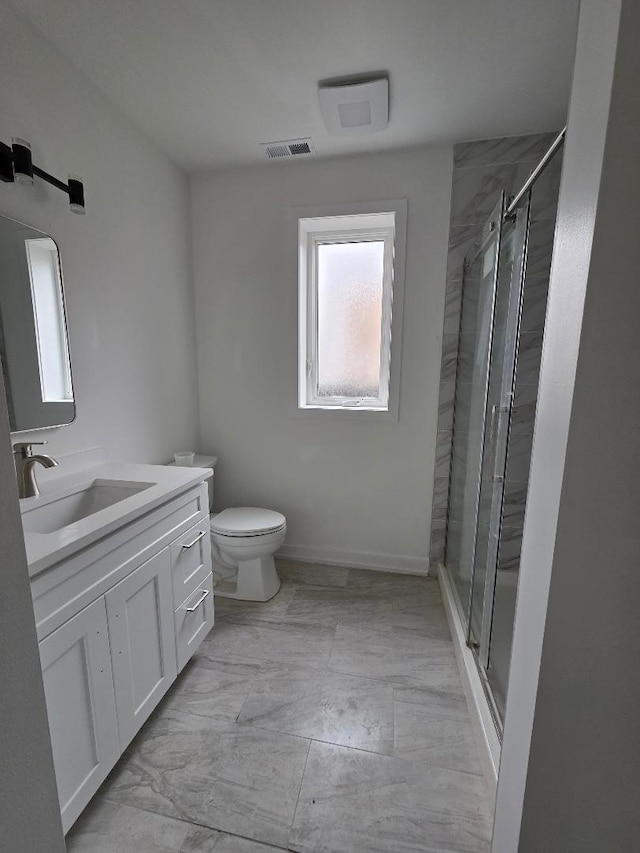 full bathroom with toilet, vanity, visible vents, marble finish floor, and a shower stall