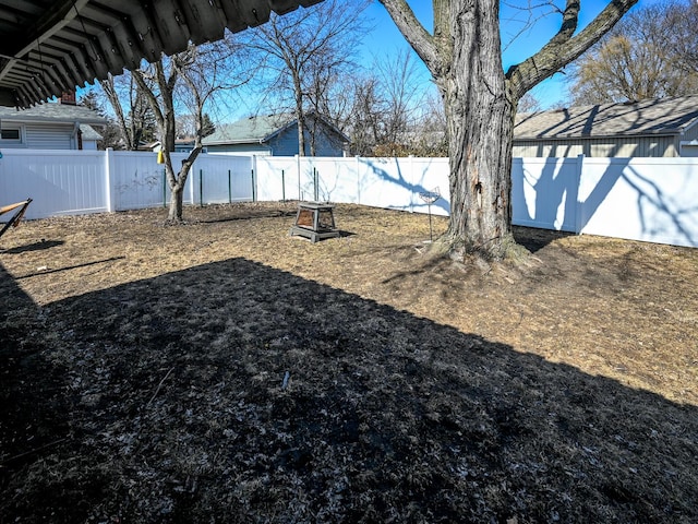 view of yard featuring a fenced backyard