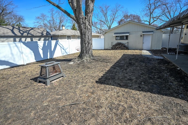 view of yard with cooling unit and a fenced backyard