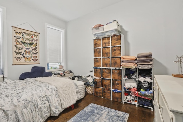 bedroom featuring wood finished floors