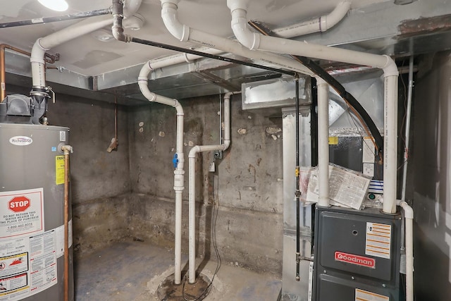 utility room featuring water heater