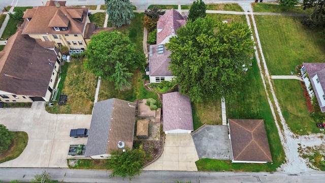 birds eye view of property with a residential view