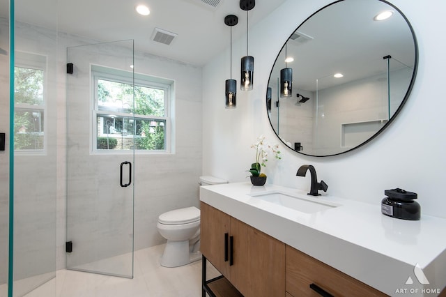 bathroom featuring toilet, recessed lighting, visible vents, vanity, and a shower stall