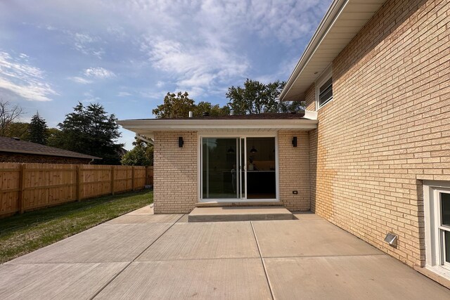 view of patio with fence