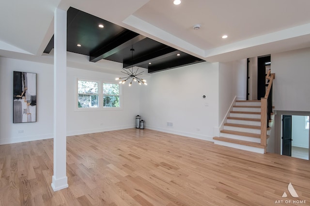 below grade area featuring stairs, recessed lighting, baseboards, and light wood-style floors