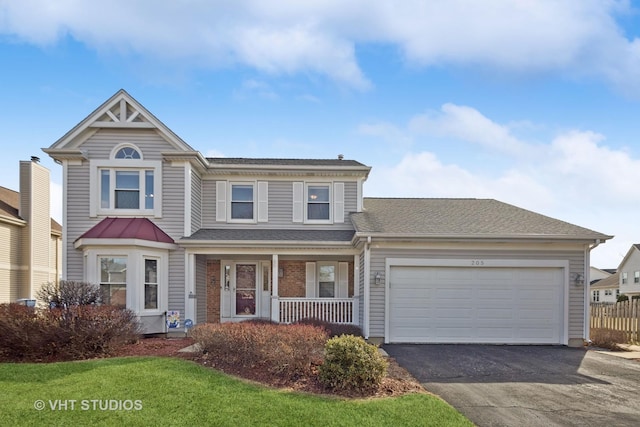 view of front of house with a shingled roof, fence, aphalt driveway, a porch, and an attached garage