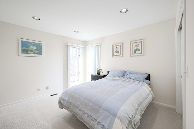 bedroom featuring recessed lighting, baseboards, visible vents, and carpet floors