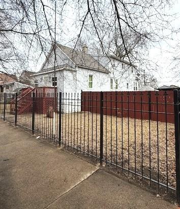 view of gate featuring fence private yard