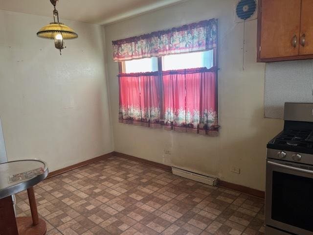 dining room featuring baseboards and a baseboard radiator